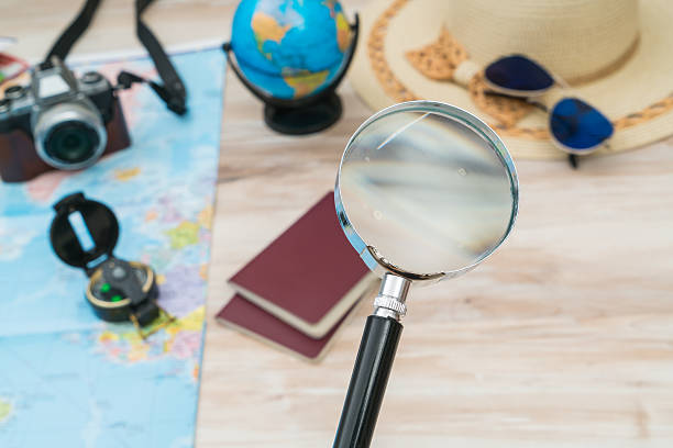 istock Travel items on hardwood floor 636301680