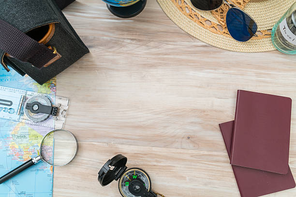 istock Travel items on hardwood floor 636301906