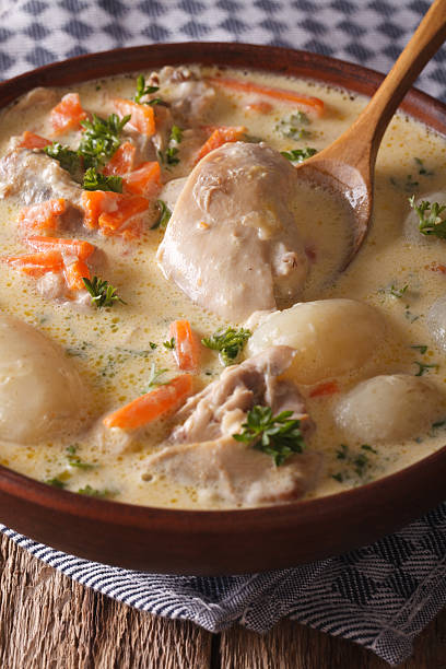 istock Belgian cream soup with chicken waterzooi close up. vertical 636303516