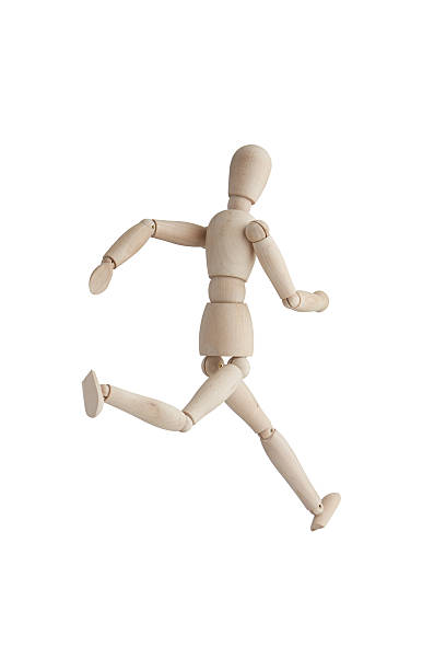 istock Wooden mannequin with running pose 636306524