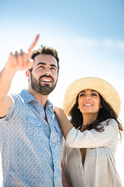 istock Happiness couple at the seaside looking at the horizont 636307126