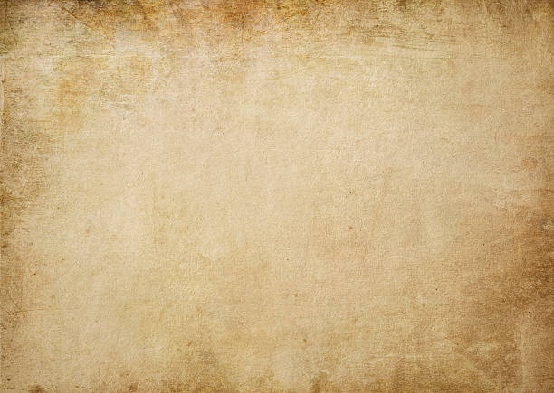 istock Old yellowed and spotted paper texture. 636307578
