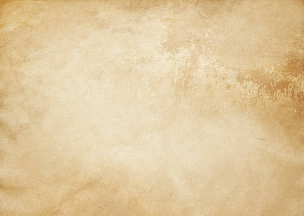 istock Old yellowed and spotted paper texture. 636307660