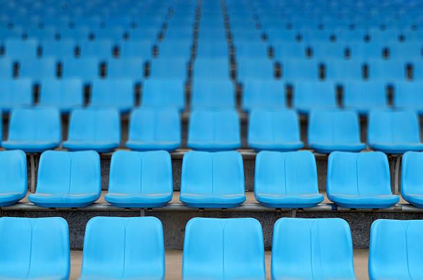 istock Rows of stadium grandstand seats 636310704