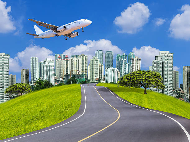 istock airplane flying take off above modern city 636313502
