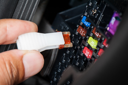 replacing the fuse in fuse box of the car