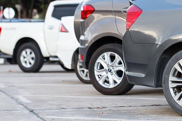 istock car parking in line and outdoor 636317822