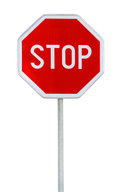 istock Red realistic stop road sign on rod isolated on white 636317918