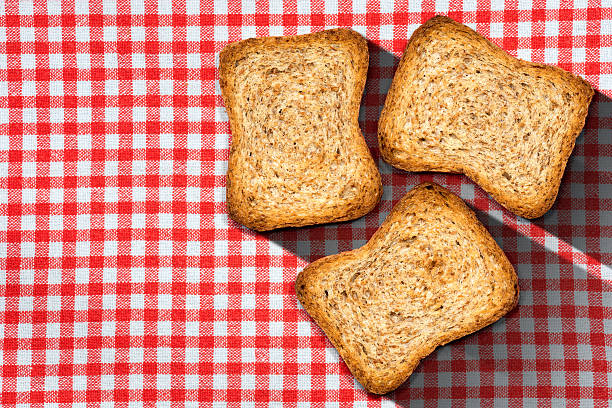 istock Rusks of Wholemeal Flour on Tablecloth 636320038