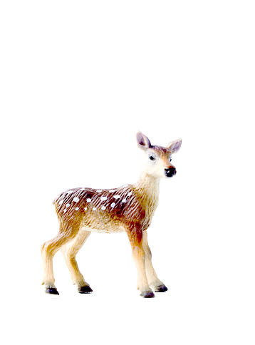 picture of a Toy deer figurine isolated over the white background