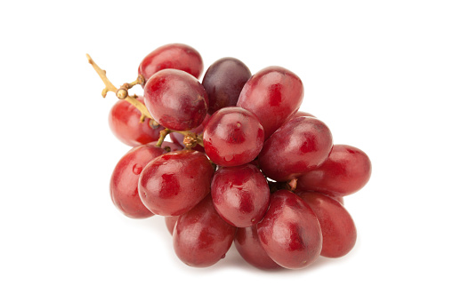 red seedless table grapes isolated on white background