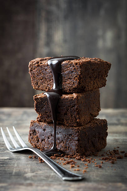istock Chocolate brownie portions 636324212