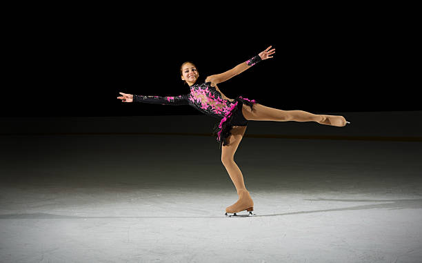 istock Young girl figure skater 636324222