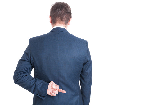 Back view of business man showing obscene middle finger gesture on behind isolated on white background with copy text space
