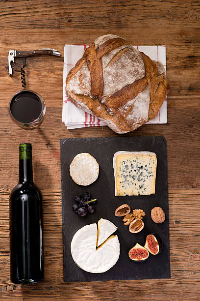 istock above view flatlay assortment cheese and wine wooden table copyspace 636327252