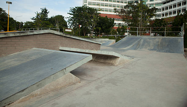 istock Outdoor concrete skateboard ramp 636327498