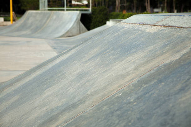 istock Outdoor concrete skateboard ramp 636327742