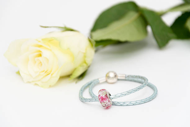 istock Beautiful bracelet with different beams with a flower 636331030