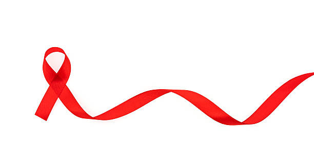 istock Red ribbon for World AIDS Day on white background 636331062