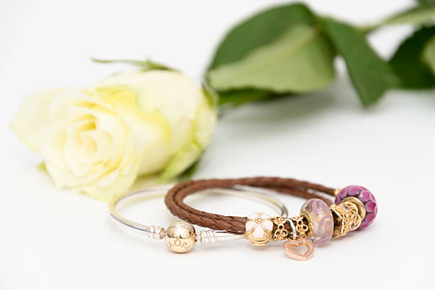 istock Two beautiful bracelets with different beams with a flower 636331402