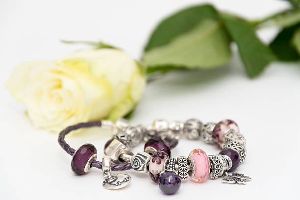 istock Two beautiful bracelets with different beams with a flower 636331424