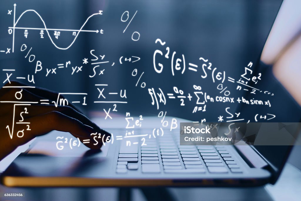 Online education concept Hands using laptop with mathematical formulas. Online education concept Mathematical Symbol Stock Photo