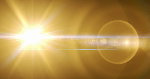 istock Gold Light Lens Flare abstract Background 636333394