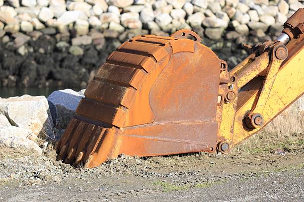 istock Close up of excavator bucket 636336794