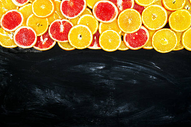 Tasty colorful bright fruity background with oranges and grapefruits