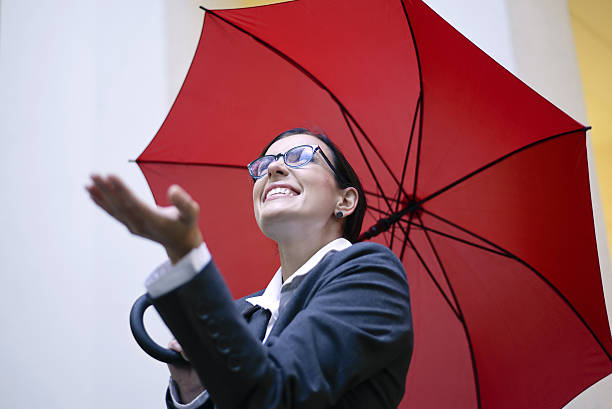 istock businesswoman in the rain 636339676