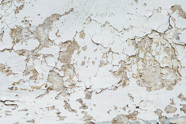 istock texture Close Up statue of Chipped White peeling paint, covered 636340770
