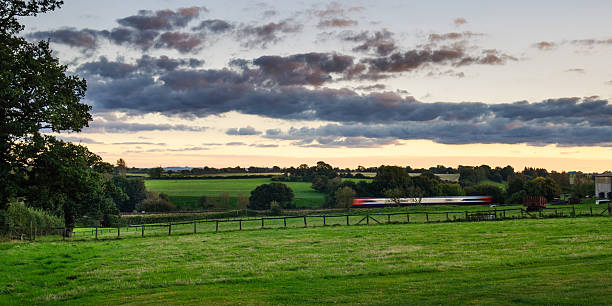 South West Trains at Gillingham Gillingham, England, United Kingdom - October 6, 2012: A South West Trains Class 159 passenger train speeds through farmland in north Dorset's Blackmore Vale. blackmore vale stock pictures, royalty-free photos & images