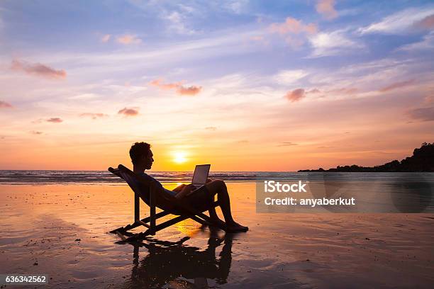 Business Man With Laptop Working On The Beach Stock Photo - Download Image Now - Working, Beach, Laptop