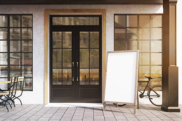 istock Cafe with a standing poster, toned 636343542