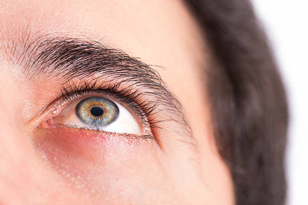 istock Blue eyes of a man 636346972