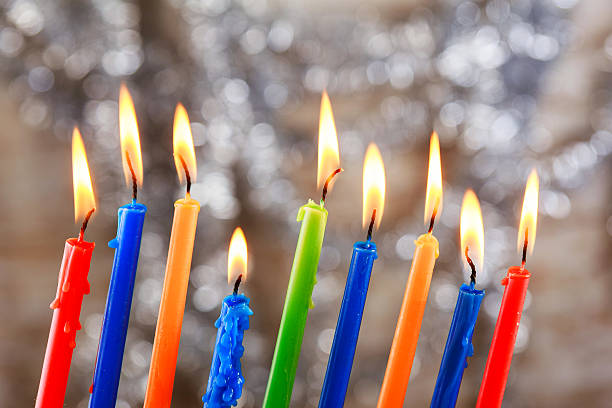 istock Jewish holiday Tallit Lighting Hanukkah Candles celebration 636348242