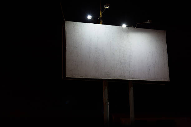 istock Night View Of Big Billboard Illuminated By Lanterns. 636348532