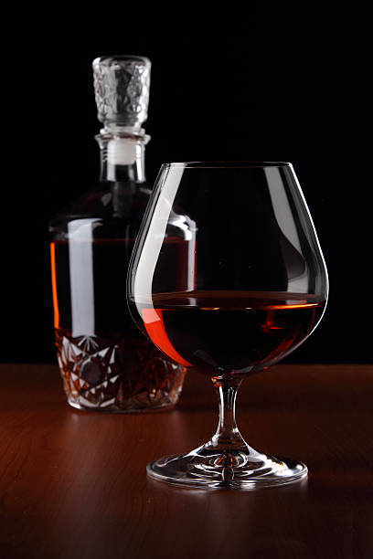 istock Brandy glass and bottle 636350872