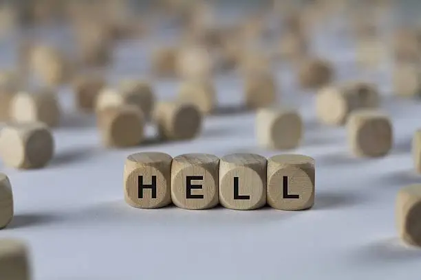 Photo of hell - cube with letters, sign with wooden cubes