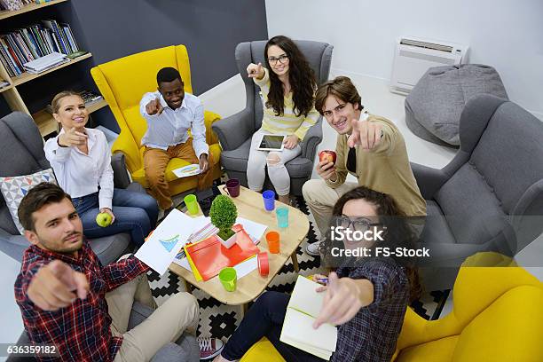 Young Team Of Freelancers Searching Information Making Business Tasks Consulting Stock Photo - Download Image Now