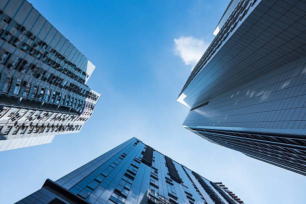 istock low angle view of business buildings 636360888
