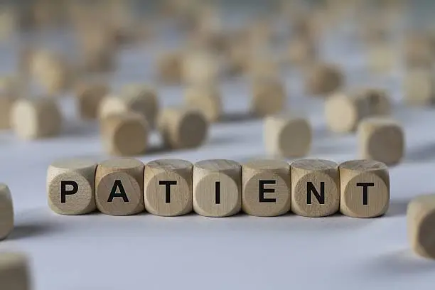 Photo of patient - cube with letters, sign with wooden cubes