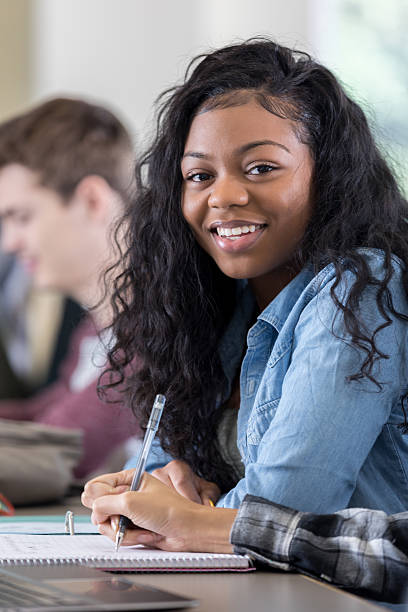 istock Beautiful African American college student 636362402