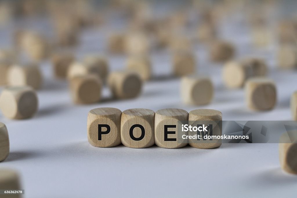 poem - cube with letters, sign with wooden cubes Article Stock Photo