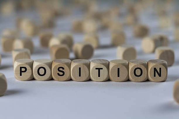 istock position - cube with letters, sign with wooden cubes 636362572
