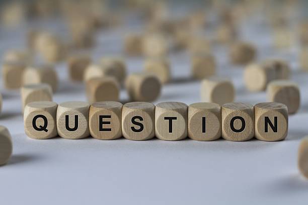 istock question - cube with letters, sign with wooden cubes 636364830