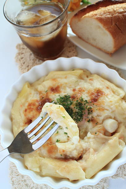 istock macanori pasta and seafood gratin 636365324
