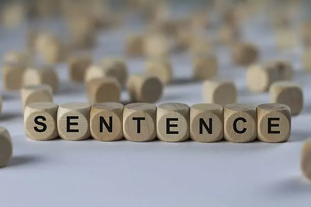 sentence - cube with letters, sign with wooden cubes