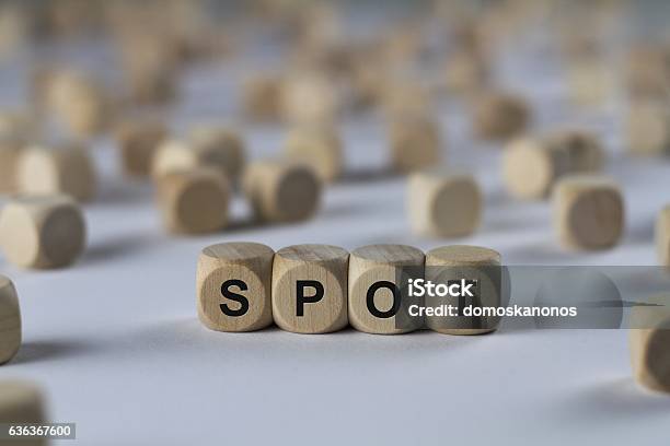 Spot Cube With Letters Sign With Wooden Cubes Stock Photo - Download Image Now - Arranging, Blob, Development