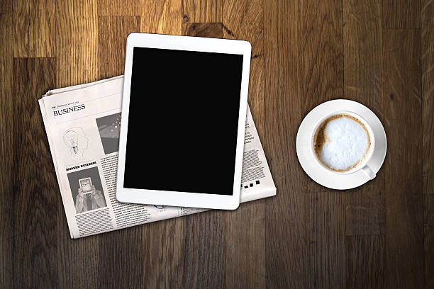istock Daily newspaper, coffee and tablet with a blank screen. 636367874